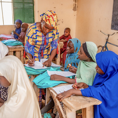 Out-of-school adolescent girls attend a non-formal learning center in Borno, Nigeria, as part of USAID’s Opportunities to Learn Activity.